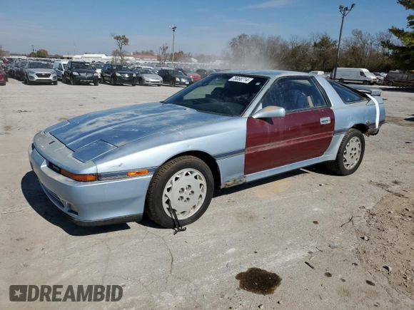 1989 Toyota Supra z VIN JT2MA70J8K0114002, wystawiony jako Copart lot #78068714 z przebiegiem 196 448 mil mil oraz Czysty tytuł • Clean title. Historia ofert i sprzedaży dostępna na DreamBid. Obrazek 1.