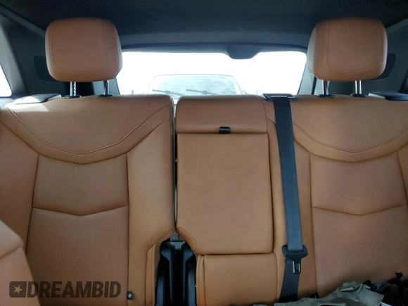 2022 Cadillac XT5 FWD Premium Luxury z VIN 1GYKNCRS9NZ180043, wystawiony jako Copart lot #51352195 z przebiegiem 12 399 mil mil oraz Szkoda całkowita • Salvage title. Historia ofert i sprzedaży dostępna na DreamBid. Obrazek 10.