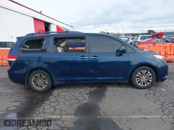 2011 Toyota Sienna XLE AAS with VIN 5TDYK3DCXBS113103, listed as a IAAI auction lot 41505972 with 170,919 mi miles and . Bid and sale history available at DreamBid. Image 13.