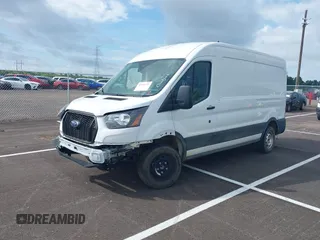 2022 Ford Transit Cargo with VIN 1FTBR1C83NKA81478, listed as a IAAI auction lot 42491735 with 12,902 mi miles and . Bid and sale history available at DreamBid. Image 2.