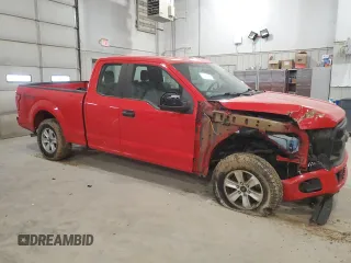 2015 Ford F-150 XLT with VIN 1FTEX1E8XFKF04042, listed as a Copart auction lot 50304345 with 115,702 mi miles and Salvage Title. Bid and sale history available at DreamBid. Image 4.