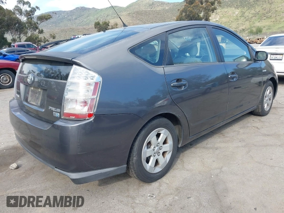 2007 Toyota Prius with VIN JTDKB20U873220660, listed as a IAAI auction lot 42012077 with 177,519 mi miles. Bid and sale history available at carsss.com. Image 4.