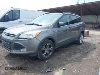 2013 Ford Escape SE with VIN 1FMCU0GX8DUB98700, listed as a IAAI auction lot 42012090 with 221,394 mi miles. Bid and sale history available at carsss.com. Image 2.