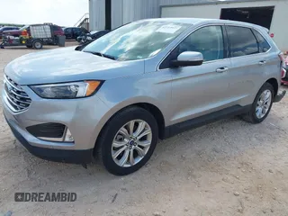 2022 Ford Edge Titanium with VIN 2FMPK4K99NBB06136, listed as a IAAI auction lot 42733977 with 57,794 mi miles and . Bid and sale history available at DreamBid. Image 2.