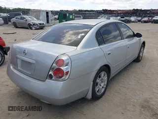 2005 Nissan Altima 2.5 S with VIN 1N4AL11E65C269739, listed as a IAAI auction lot 42051794 with 174,919 mi miles. Bid and sale history available at carsss.com. Image 4.