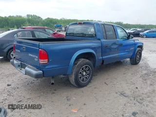 2001 Dodge Dakota Sport with VIN 1B7HG2AN21S194735, listed as a IAAI auction lot 42182165 with 163,350 mi miles and . Bid and sale history available at carsss.com. Image 4.