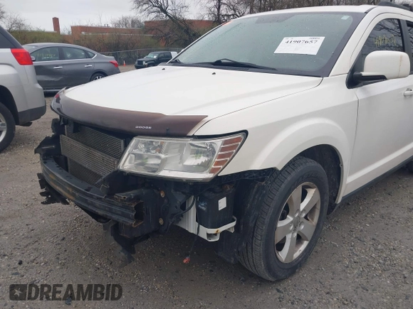 2012 Dodge Journey SXT with VIN 3C4PDCCG6CT132457, listed as a IAAI auction lot 41907657 with 169,160 mi miles and . Bid and sale history available at DreamBid. Image 14.