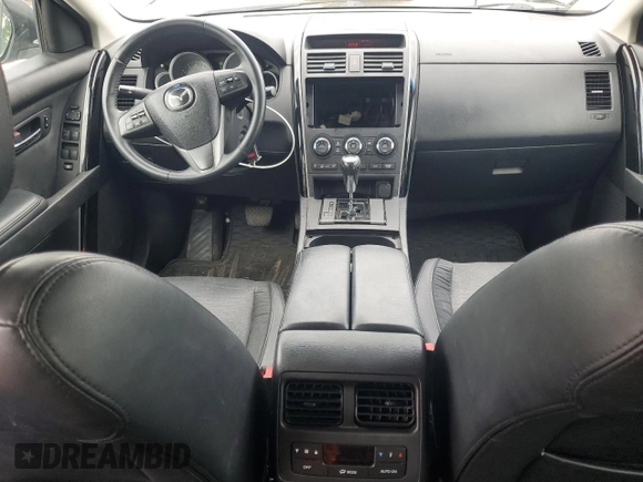 2014 Mazda CX-9 Touring с VIN JM3TB2CA2E0431879, выставлен на аукционе Copart как лот 64778845 с пробегом 145 476 миль миль и Чистый • Clean title. История ставок и продаж доступна на DreamBid. Изображение 8.