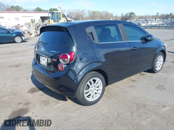 2014 Chevrolet Sonic LT with VIN 1G1JC6SB4E4151333, listed as a IAAI auction lot 41815985 with 112,123 mi miles. Bid and sale history available at carsss.com. Image 4.