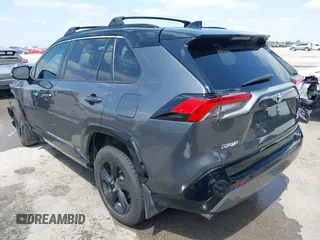 2021 Toyota RAV4 Hybrid XSE with VIN 2T3E6RFV8MW026973, listed as a IAAI auction lot 42052289 with 94,857 mi miles and . Bid and sale history available at DreamBid. Image 3.
