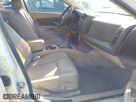 2006 Cadillac CTS with VIN 1G6DP577960191362, listed as a IAAI auction lot 41970879 with 168,562 mi miles. Bid and sale history available at carsss.com. Image 5.