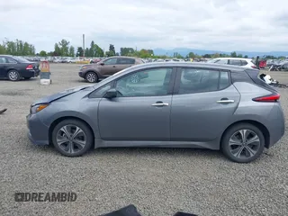 2020 Nissan LEAF SV Plus z VIN 1N4BZ1CP6LC304083, wystawiony jako IAAI lot #42135309 z przebiegiem 80 804 mil mil oraz . Historia ofert i sprzedaży dostępna na DreamBid. Obrazek 14.