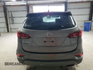 2018 Hyundai Santa Fe 2.4L z VIN 5NMZTDLB2JH096699, wystawiony jako Copart lot #53795775 z przebiegiem 165 794 mil mil oraz Szkoda całkowita • Salvage title. Historia ofert i sprzedaży dostępna na DreamBid. Obrazek 6.