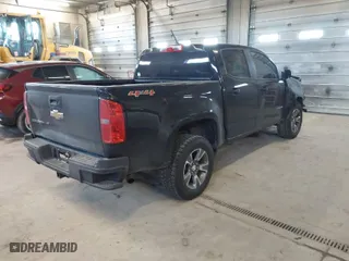 2018 Chevrolet Colorado 4WD Work Truck with VIN 1GCGTBEN9J1102477, listed as a IAAI auction lot 41275132 with 253,267 mi miles. Bid and sale history available at carsss.com. Image 4.