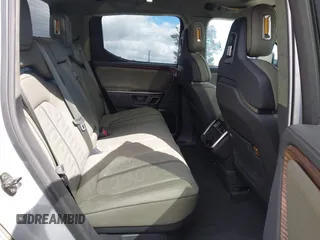2023 Rivian R1T Adventure z VIN 7FCTGBAA9PN027894, wystawiony jako IAAI lot #42061339 z przebiegiem 5047 mil mil oraz . Historia ofert i sprzedaży dostępna na DreamBid. Obrazek 8.