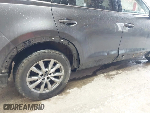 2017 Mazda CX-9 Touring with VIN JM3TCBCY1H0127229, listed as a IAAI auction lot 42320263 with 85,890 mi miles and . Bid and sale history available at DreamBid. Image 6.
