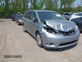 2014 Toyota Sienna XLE with VIN 5TDYK3DC9ES413283, listed as a IAAI auction lot 42091379 with 184,506 mi miles and . Bid and sale history available at DreamBid. Image 1.