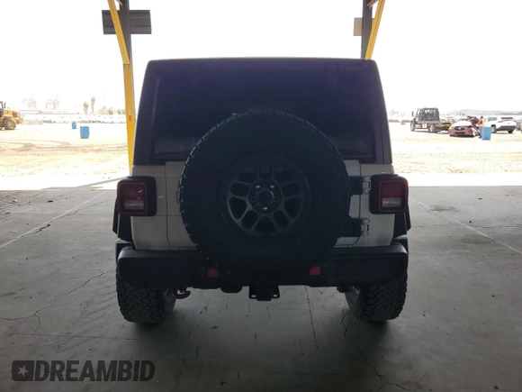 2021 Jeep Wrangler Unlimited Rubicon z VIN 1C4JJXFG5MW767036, wystawiony jako Copart lot #56918355 z przebiegiem 52 994 mil mil oraz Szkoda całkowita • Salvage title. Historia ofert i sprzedaży dostępna na DreamBid. Obrazek 6.