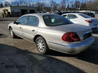 2002 Lincoln Continental with VIN 1LNHM97V92Y690473, listed as a Copart auction lot 42919635 with 49,232 mi miles and Salvage Title. Bid and sale history available at carsss.com. Image 2.