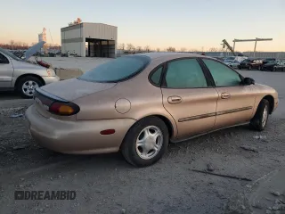 1997 Ford Taurus GL z VIN 1FALP52U9VG142664, wystawiony jako Copart lot #84054224 z przebiegiem 151 610 mil mil oraz Czysty tytuł • Clean title. Historia ofert i sprzedaży dostępna na DreamBid. Obrazek 3.