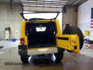 2015 Jeep Wrangler Unlimited Sahara with VIN 1C4BJWEG1FL704231, listed as a Copart auction lot 46683275 with 133,097 mi miles and Salvage Title. Bid and sale history available at carsss.com. Image 6.