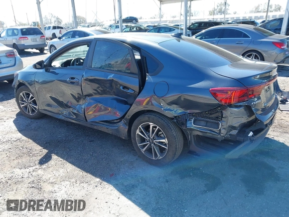 2023 Kia Forte LXS with VIN 3KPF24AD6PE648764, listed as a IAAI auction lot 41866394 with 26,341 mi miles and . Bid and sale history available at DreamBid. Image 3.