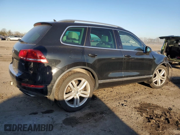 2012 Volkswagen Touareg Sport z VIN WVGEF9BP9CD006844, wystawiony jako Copart lot #43216485 z przebiegiem 120 059 mil mil oraz Szkoda całkowita • Salvage title. Historia ofert i sprzedaży dostępna na DreamBid. Obrazek 3.