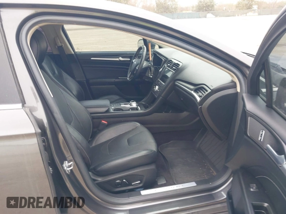 2017 Ford Fusion Titanium with VIN 3FA6P0SU8HR104727, listed as a IAAI auction lot 41242482 with 83,021 mi miles and . Bid and sale history available at DreamBid. Image 5.