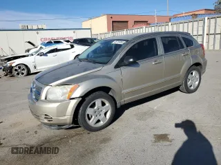 2009 Dodge Caliber SXT z VIN 1B3HB48A79D156772, wystawiony jako Copart lot #45719705 z przebiegiem 126 090 mil mil oraz Czysty tytuł • Clean title. Historia ofert i sprzedaży dostępna na DreamBid. Obrazek 1.