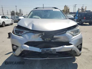 2018 Toyota RAV4 XLE with VIN JTMWFREV1JD119879, listed as a Copart auction lot 52236135 with 79,897 mi miles and Salvage Title. Bid and sale history available at carsss.com. Image 5.
