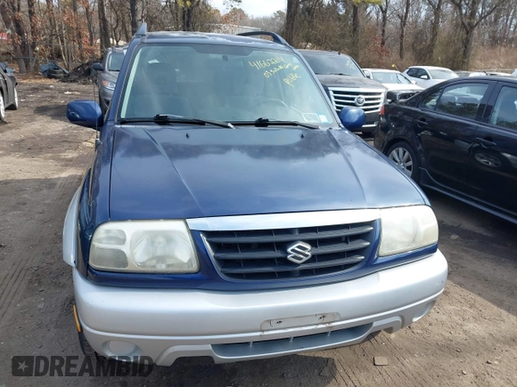 2003 Suzuki Grand Vitara z VIN JS3TD62V534105807, wystawiony jako IAAI lot #41662214 z przebiegiem 111 087 mil mil oraz . Historia ofert i sprzedaży dostępna na DreamBid. Obrazek 6.