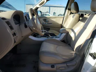2006 Mercury Mariner Luxury with VIN 4M2CU57126KJ19429, listed as a Copart auction lot 46883765 with 150,486 mi miles and Clean title. Bid and sale history available at DreamBid. Image 7.