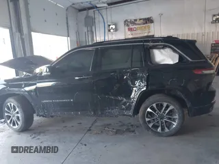 2023 Jeep Grand Cherokee Overland with VIN 1C4RJHDG5PC507978, listed as a IAAI auction lot 41394199 with 57,323 mi miles and . Bid and sale history available at DreamBid. Image 14.