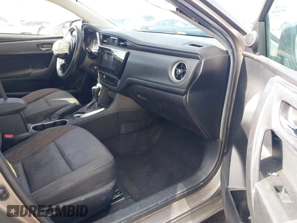 2019 Toyota Corolla L with VIN 5YFBURHE8KP892394, listed as a IAAI auction lot 41917095 with 89,073 mi miles. Bid and sale history available at carsss.com. Image 5.