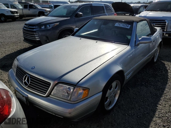 1999 Mercedes-Benz SL-Class with VIN WDBFA68F0XF176572, listed as a Copart auction lot 74715254 with 0 mi miles and Salvage Title. Bid and sale history available at carsss.com. Image 1.