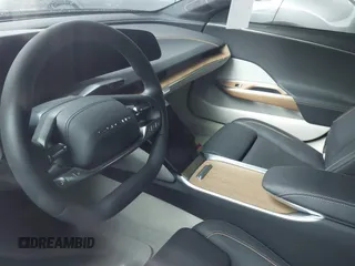 2023 Lucid Air Touring with VIN 50EA1TEA1PA004823, listed as a IAAI auction lot 41728833 with 1 mi miles. Bid and sale history available at carsss.com. Image 16.