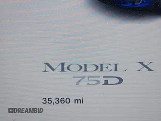 2018 Tesla Model X 75D with VIN 5YJXCAE21JF132628, listed as a IAAI auction lot 42081282 with 35,360 mi miles and . Bid and sale history available at carsss.com. Image 7.