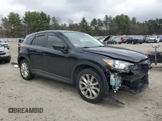 2014 Mazda CX-5 Grand Touring with VIN JM3KE4DY5E0392571, listed as a Copart auction lot 51044335 with 141,334 mi miles and Clean Title. Bid and sale history available at carsss.com. Image 4.