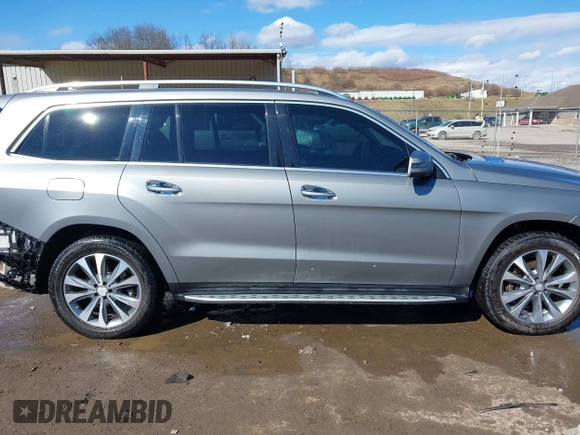 2016 Mercedes-Benz GL with VIN 4JGDF6EE3GA633180, listed as a IAAI auction lot 41623280 with 120,294 mi miles. Bid and sale history available at carsss.com. Image 14.