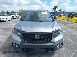 2021 Honda Passport Sport with VIN 5FNYF8H24MB004016, listed as a IAAI auction lot 41696379 with 85,373 mi miles and . Bid and sale history available at DreamBid. Image 12.