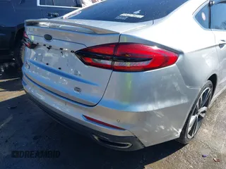 2019 Ford Fusion Titanium with VIN 3FA6P0D91KR187109, listed as a IAAI auction lot 41646320 with 107,125 mi miles. Bid and sale history available at carsss.com. Image 6.