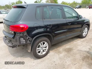 2013 Volkswagen Tiguan S with VIN WVGAV3AX2DW594334, listed as a IAAI auction lot 42405989 with 96,559 mi miles and . Bid and sale history available at DreamBid. Image 4.