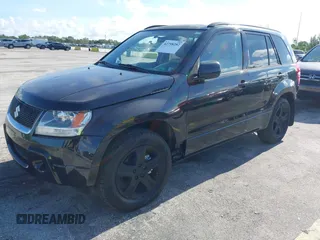 2006 Suzuki Grand Vitara Luxury z VIN JS3TD947664104590, wystawiony jako IAAI lot #42798282 z przebiegiem 146 725 mil mil oraz . Historia ofert i sprzedaży dostępna na DreamBid. Obrazek 2.