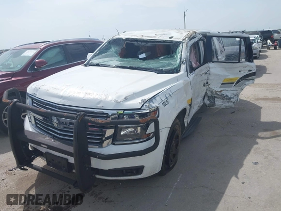 2016 Chevrolet Tahoe Commercial z VIN 1GNLCDEC9GR299693, wystawiony jako IAAI lot #42630221 z przebiegiem 127 081 mil mil oraz . Historia ofert i sprzedaży dostępna na DreamBid. Obrazek 2.