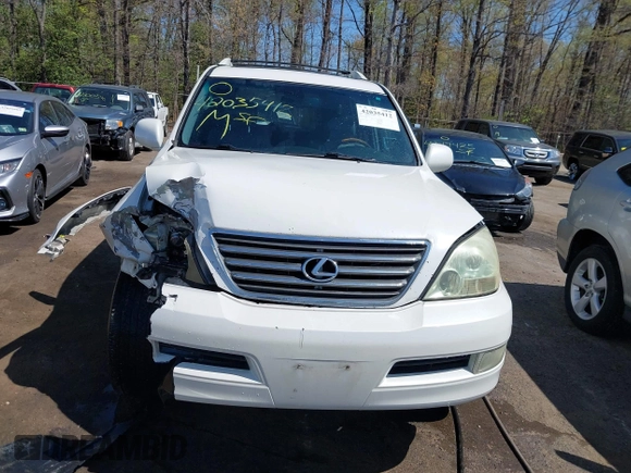 2007 Lexus GX with VIN JTJBT20X570144529, listed as a IAAI auction lot 42035412 with 265,886 mi miles. Bid and sale history available at carsss.com. Image 12.