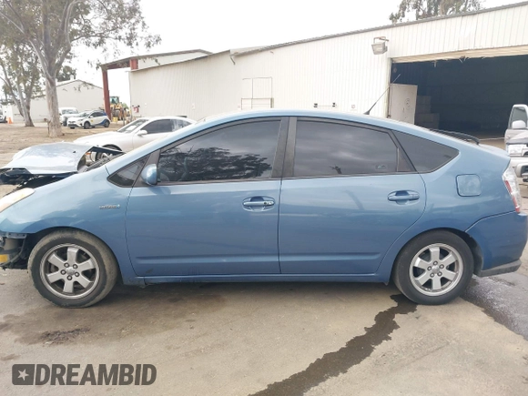 2007 Toyota Prius with VIN JTDKB20U477685445, listed as a IAAI auction lot 42020786 with 243,679 mi miles. Bid and sale history available at carsss.com. Image 14.