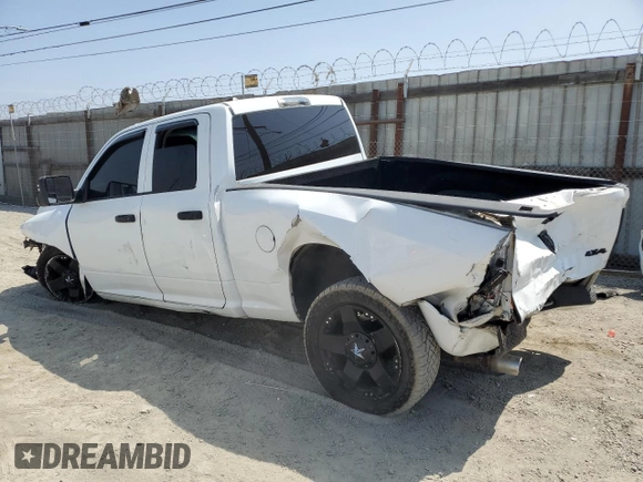 2014 Ram 1500 Express with VIN 1C6RR7FT9ES177804, listed as a Copart auction lot 61002585 with 213,442 mi miles and Salvage title. Bid and sale history available at DreamBid. Image 2.