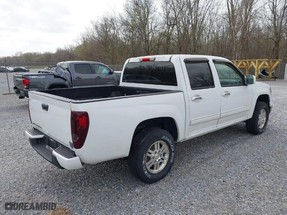 2011 Chevrolet Colorado LT w/1LT with VIN 1GCHTCFE6B8141559, listed as a IAAI auction lot 41812559 with 147,848 mi miles. Bid and sale history available at carsss.com. Image 4.