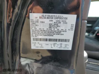 2010 Mazda Tribute Touring with VIN 4F2CY9C75AKM02945, listed as a Copart auction lot 67784674 with 134,363 mi miles and Salvage Title. Bid and sale history available at carsss.com. Image 13.