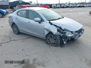 2019 Toyota Yaris Sedan L with VIN 3MYDLBYV8KY524043, listed as a IAAI auction lot 41419420 with 55,668 mi miles. Bid and sale history available at carsss.com. Image 1.